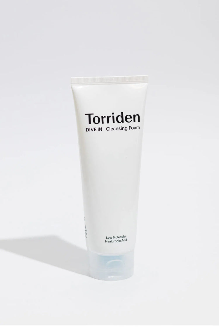 The Torriden DIVE-IN Low Molecular Hyaluronic Acid Cleansing Foam is a hydrating, low-pH cleanser formulated with 5D Hyaluronic Acid and Panthenol to deeply cleanse while locking in moisture. Its rich, creamy foam removes dirt and impurities without stripping the skin, leaving it feeling refreshed and supple. Ideal for daily use, this vegan Korean cleanser supports a healthy skin barrier and enhances glow. Perfect for dry, sensitive, or combination skin, it ensures your face feels clean, smooth, and hydrated after every wash.